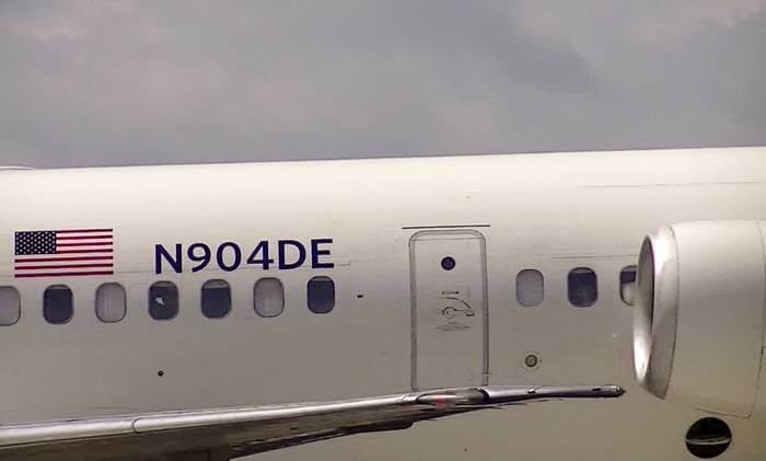 An aircraft registration/tail number displayed on the fuselage.